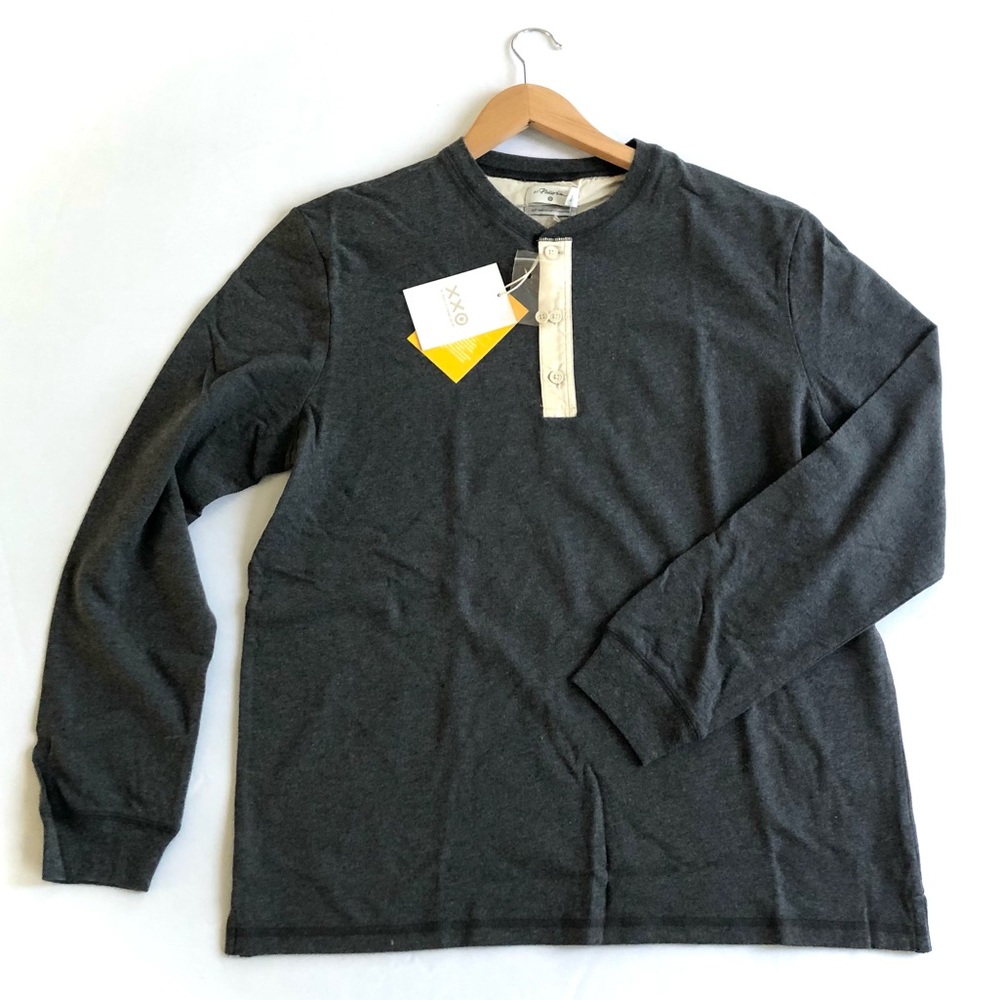 New. Long sleeve shirt. Dark gray. It's soft. It size Large.
